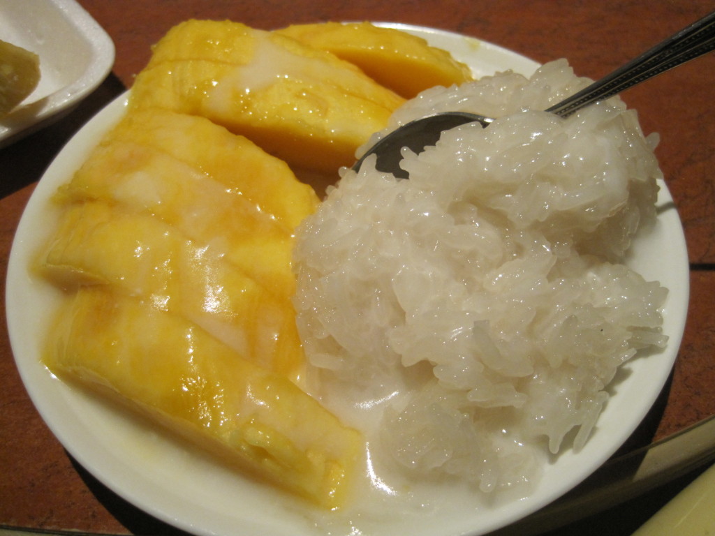 We bought 2 mangoes, with a package of warm sticky rice, and small bag of coconut milk. We brought them back to my hotel room to cut and assemble for a delicious dessert.
