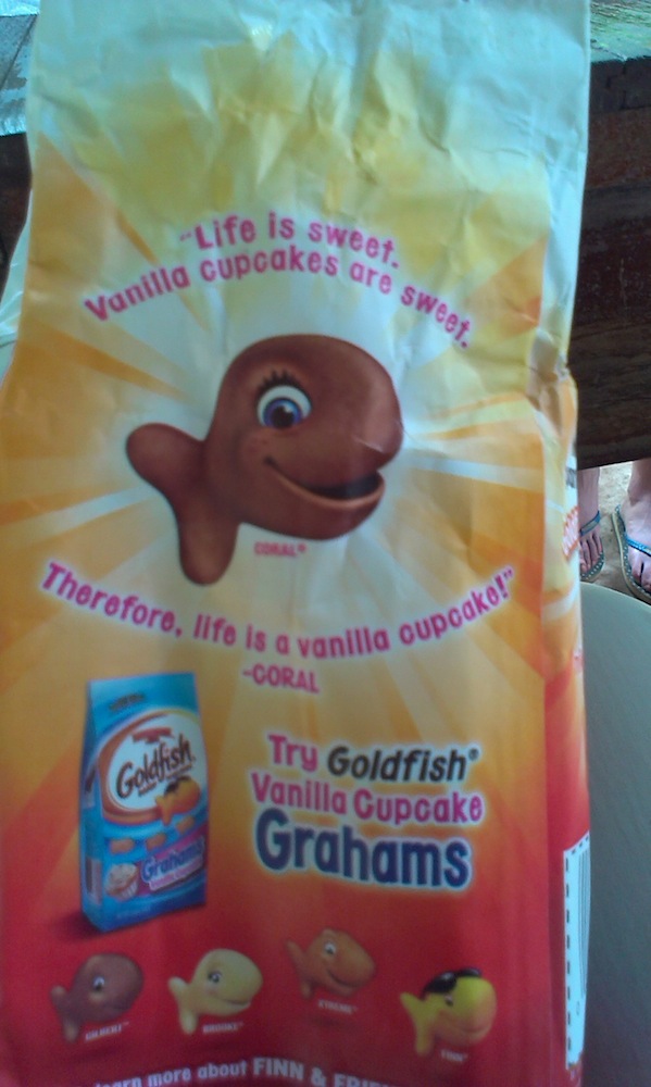 Goldfish teaching our children false reasoning. It should be "Life is sweet. Sweet is a vanilla cupcake. Therefore, life is a vanilla cupcake."