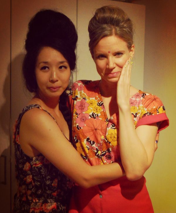 Me and my roomie hugging at our '60s party