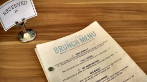 brunch menu on wooden table