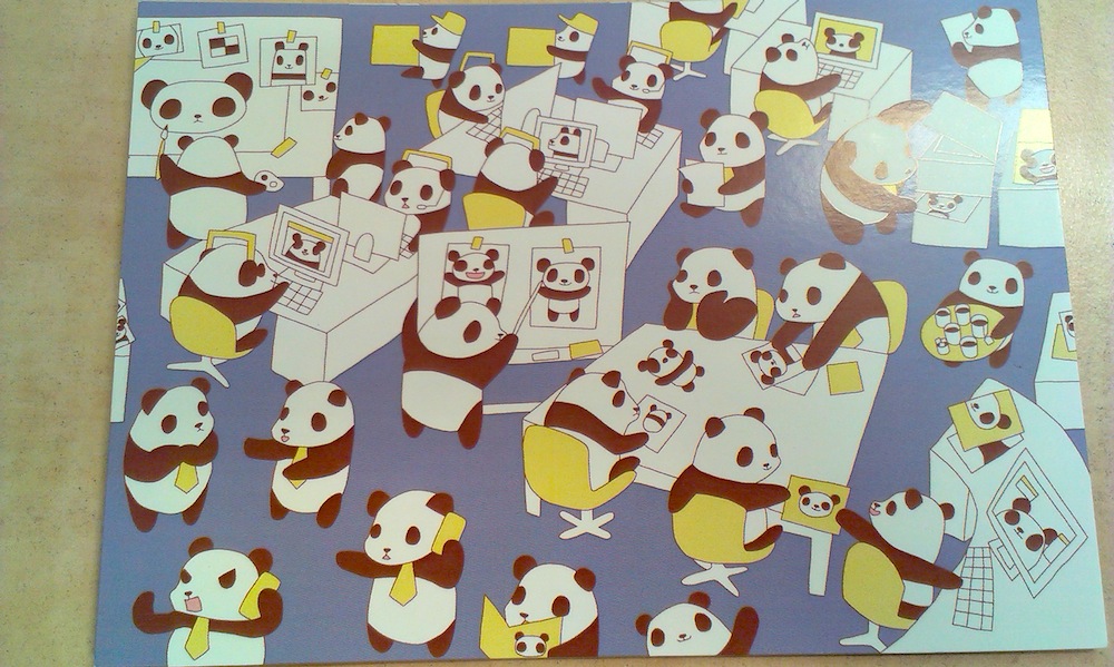Drawing of pandas in an office